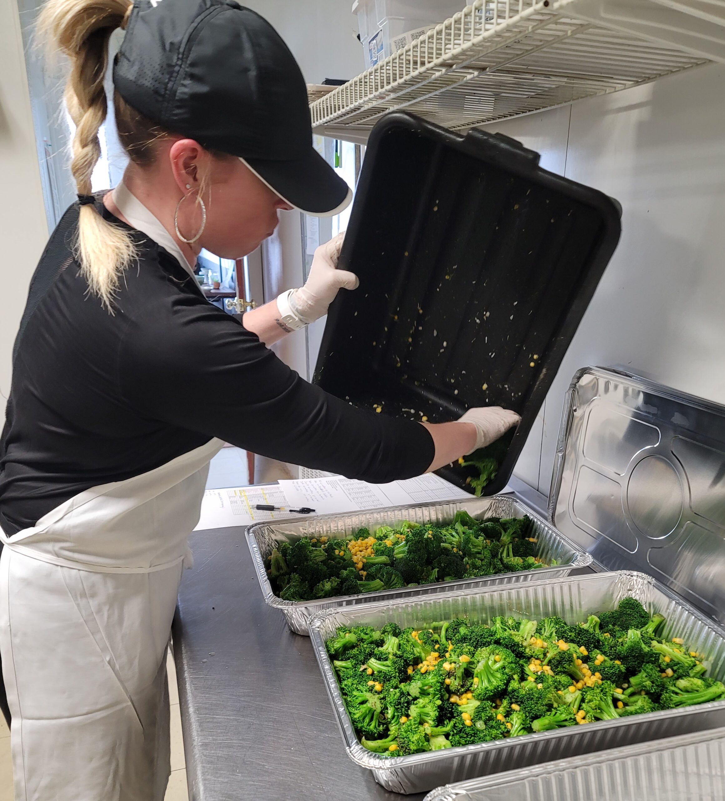 General Manager Tina King prepares meals at the Livonia headquarters