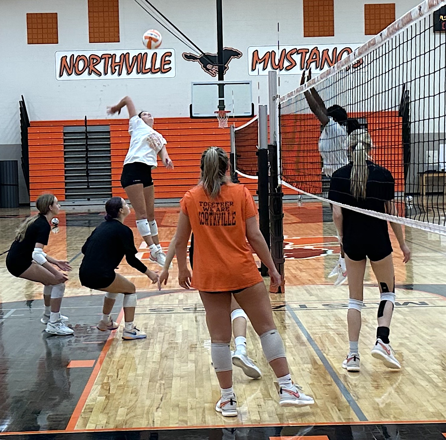 A Northville hitter gets ready to unload on a set during a Thursday morning practice