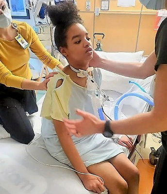 Mionna Johnson receives rehabilitation from Children's Hospital nurses within weeks after her near-fatal injury.