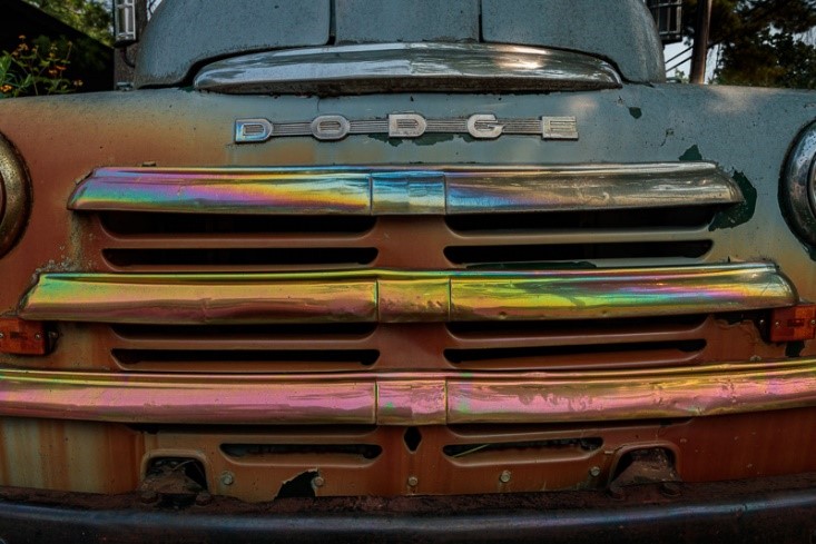One of the exhibit's images features the grill of a vintage Dodge truck.