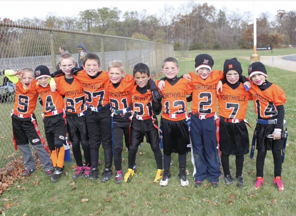 Five of Northville's stellar seniors -- Isaac Pace (4), Nick Helner (87), Caden Besco (27), Cullen Murphy (2) and Evan Deak (14) -- played flag football together long before they became a force to be reckoned with at the high school varsity level.